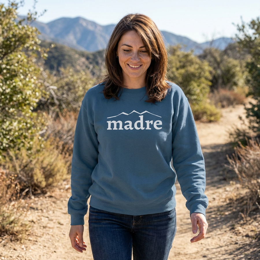 Madre Classic Embroidered Crewneck in Indigo Blue, worn on a Sierra Madre trail